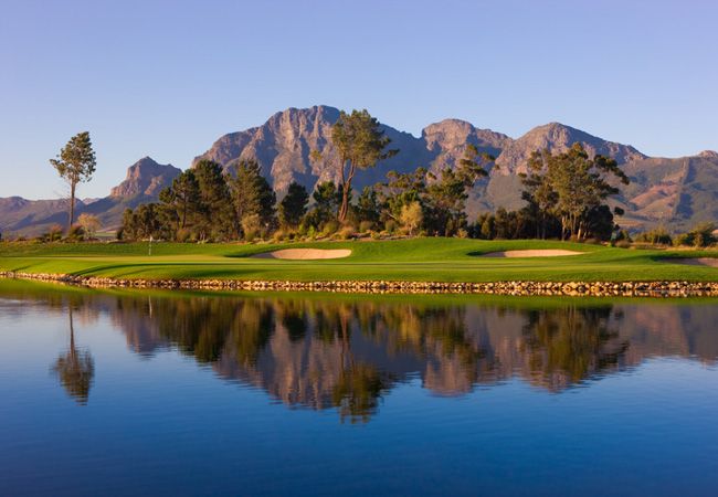 Pearl Valley golf course with the Drakenstein mountains reflected in the water